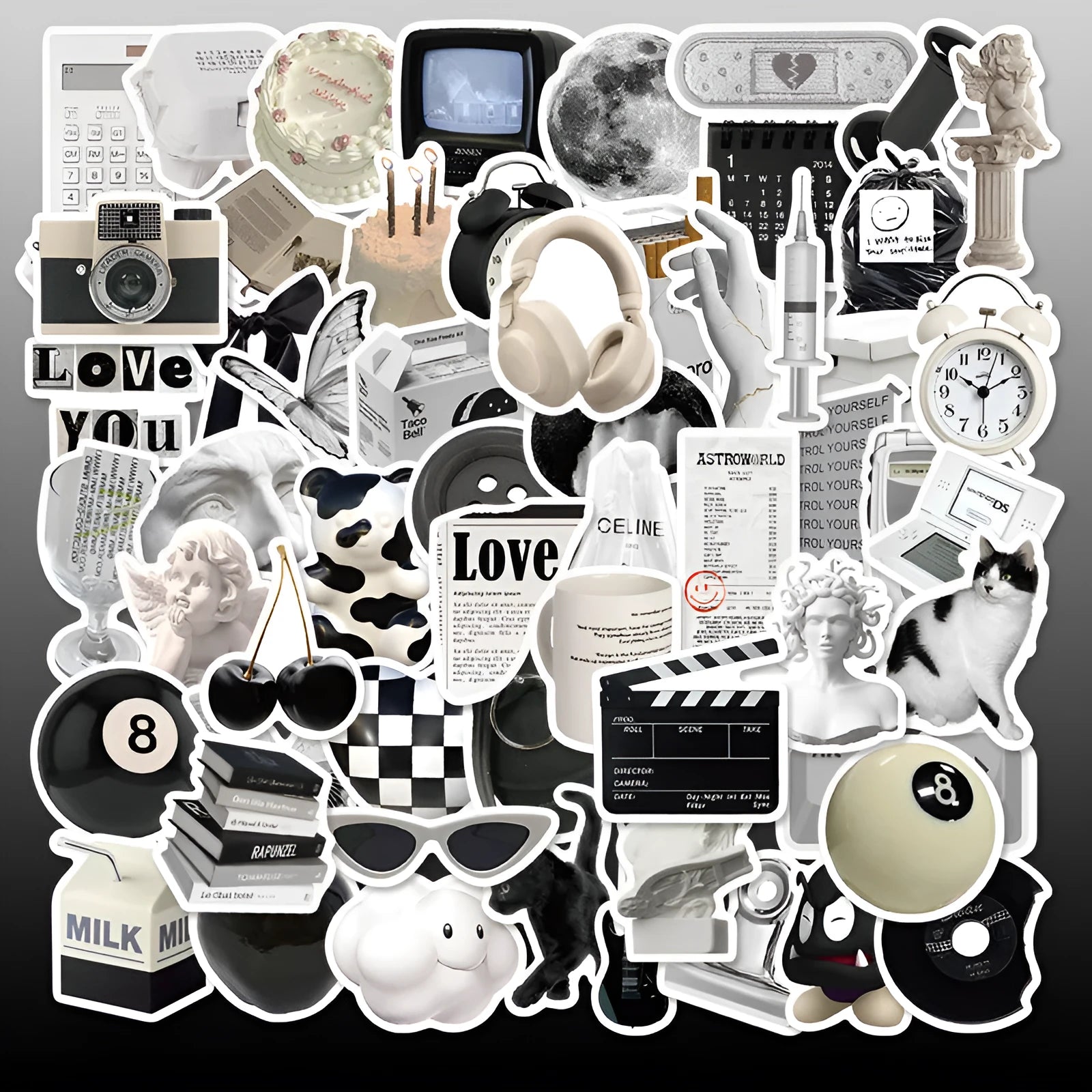 61-piece pack of black and white PVC waterproof decorative stickers laid flat.
