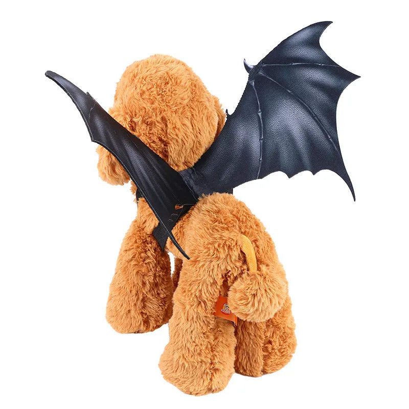 Black bat wing costume for a dog or cat on a Halloween background.