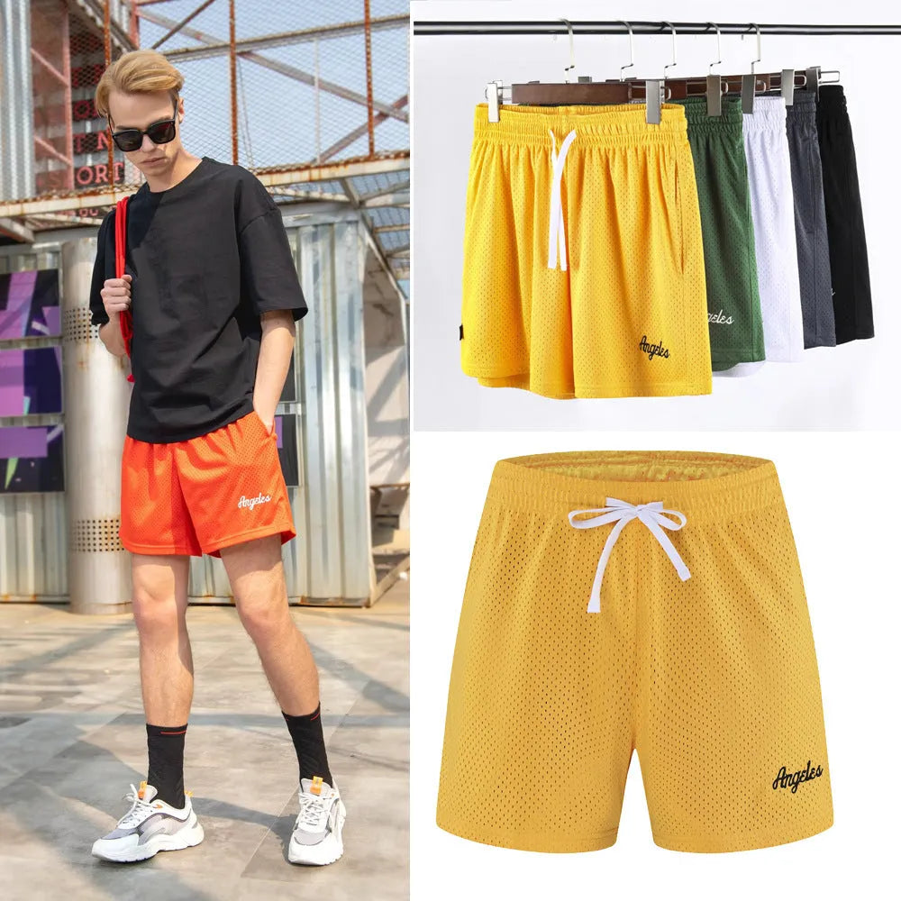 Man wearing black double-layer mesh athletic shorts during a summer run, showing breathable fabric detail.