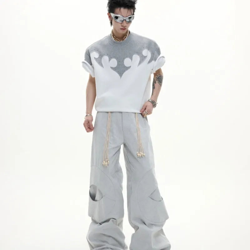 Men's grey short sleeve shirt with 3D burnt flower stitching and rhinestone details on a drop-shoulder loose fit.