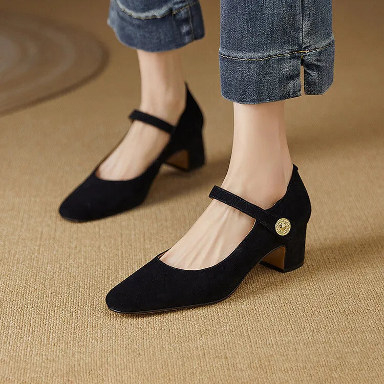 Black and dark green suede women's Mary Jane pumps with a chunky heel and square toe.