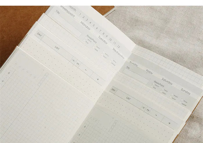 Cowhide diary refill insert showing dot grid and ruled pages with 11x21cm dimensions