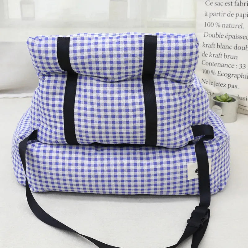 Grey and blue plaid cloth dog beds shown in two sizes for car travel.