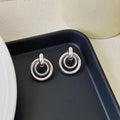 Geometric round ring earrings with irregular exotic design in gold or silver electroplated finish