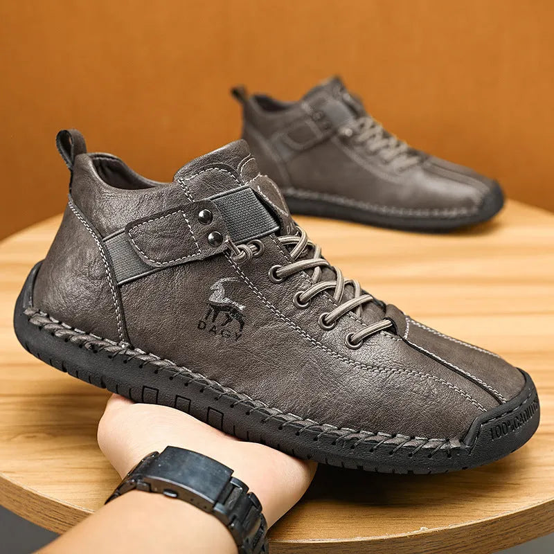 Men's casual sneakers in black with microfiber upper, rubber sole, lace-up front, and car stitching detail