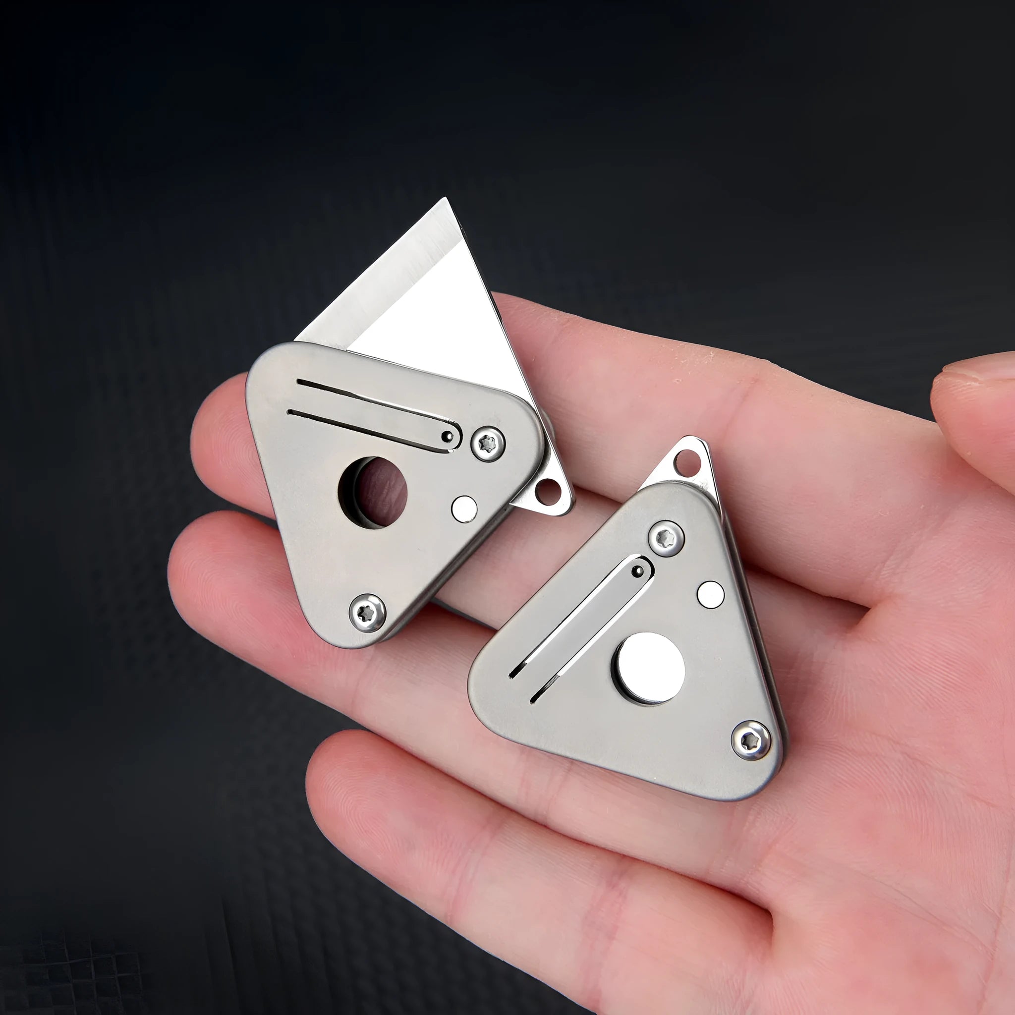 Triangle titanium alloy mini portable knife with stainless steel blade and button lock in silver gray