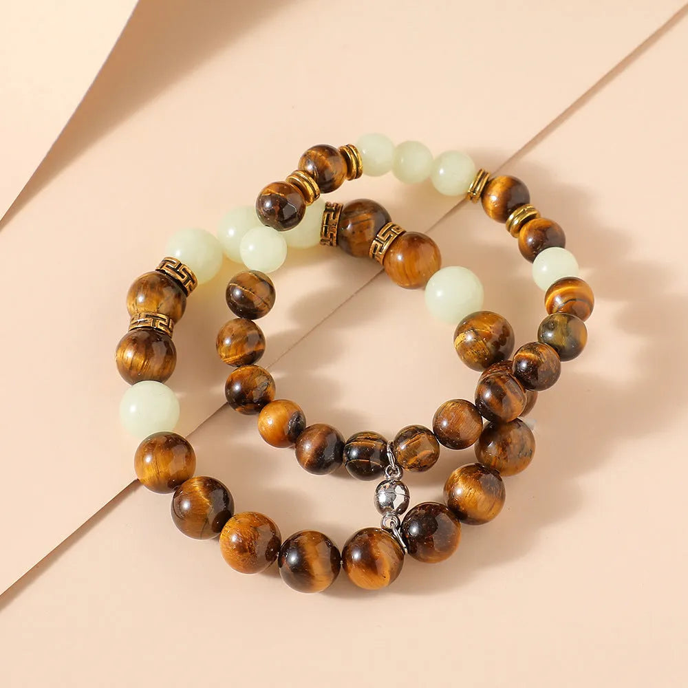Geometric couple bracelets with amber luminous stones in simple retro style