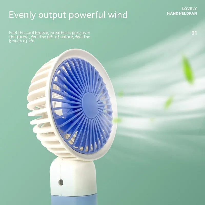 Handheld mini fan with phone holder, 16x8x6cm, five plastic blades, available in brown, pink, or blue.