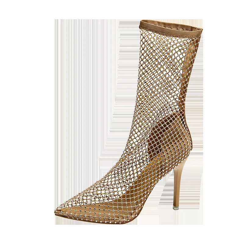 Gold coloured pointed toe stiletto high heel sandals with a mesh upper.
