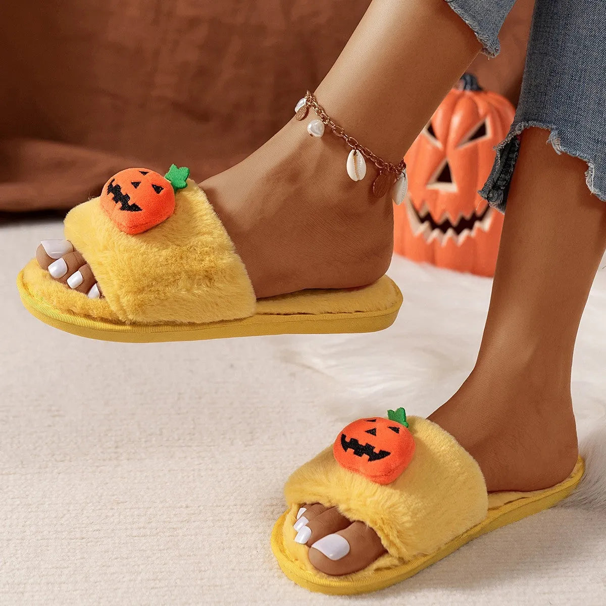 White and yellow Halloween pumpkin cartoon plush slippers with open toe design and anti-slip soles