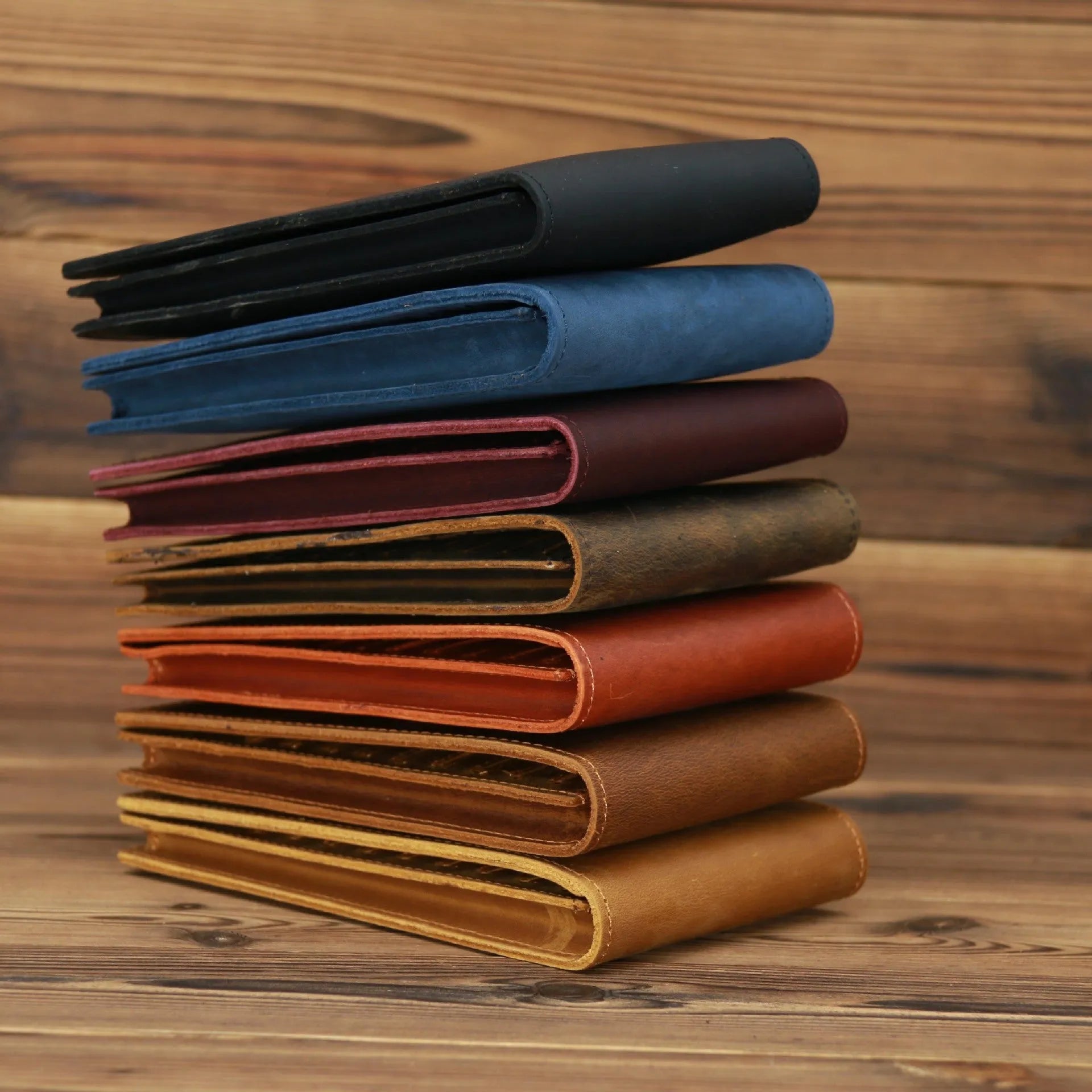 Men's long leather card wallet in crazy horse hide with 18 card slots and a phone compartment.