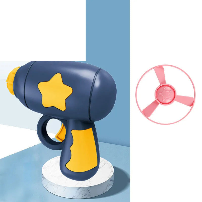 Blue and yellow LED light-up flying saucer launcher toy set with plastic gun and three discs.