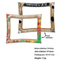 Red and green Christmas-themed inflatable photo frame held by a person.