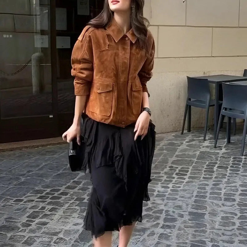 Women's brown suede-effect street chic coat with regular sleeves on a hanger