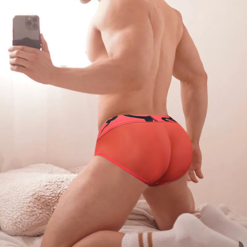 Men's solid colour cotton modal boxer shorts with breathable mesh lining in black, pink and red options