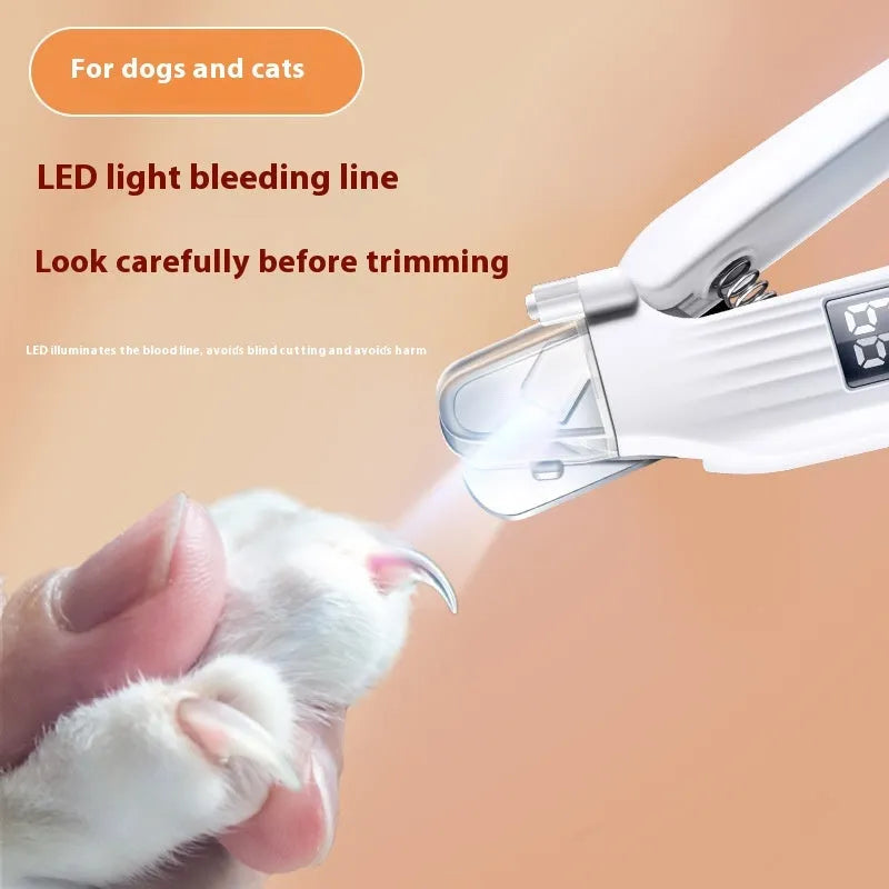 White dog nail clippers with stainless steel blades and safety guard on ergonomic ABS handle.