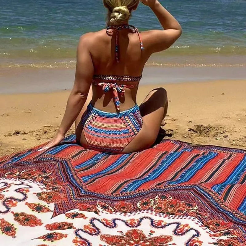 Women's three-piece swimsuit set showing split-front blouse, high-waist briefs, and longline cover-up coat on a model.