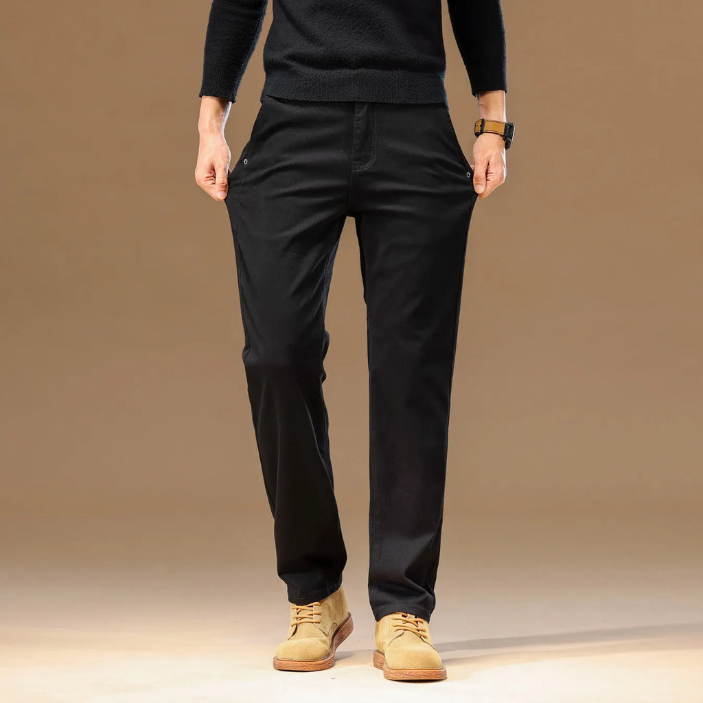 Men's cotton denim straight leg pencil trousers in black, mid waist zip fly, relaxed fit flat lay