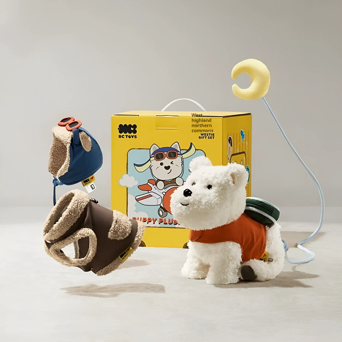 West Highland plush puppy dog soft toy in a gift set with two clothing items and PP cotton filling