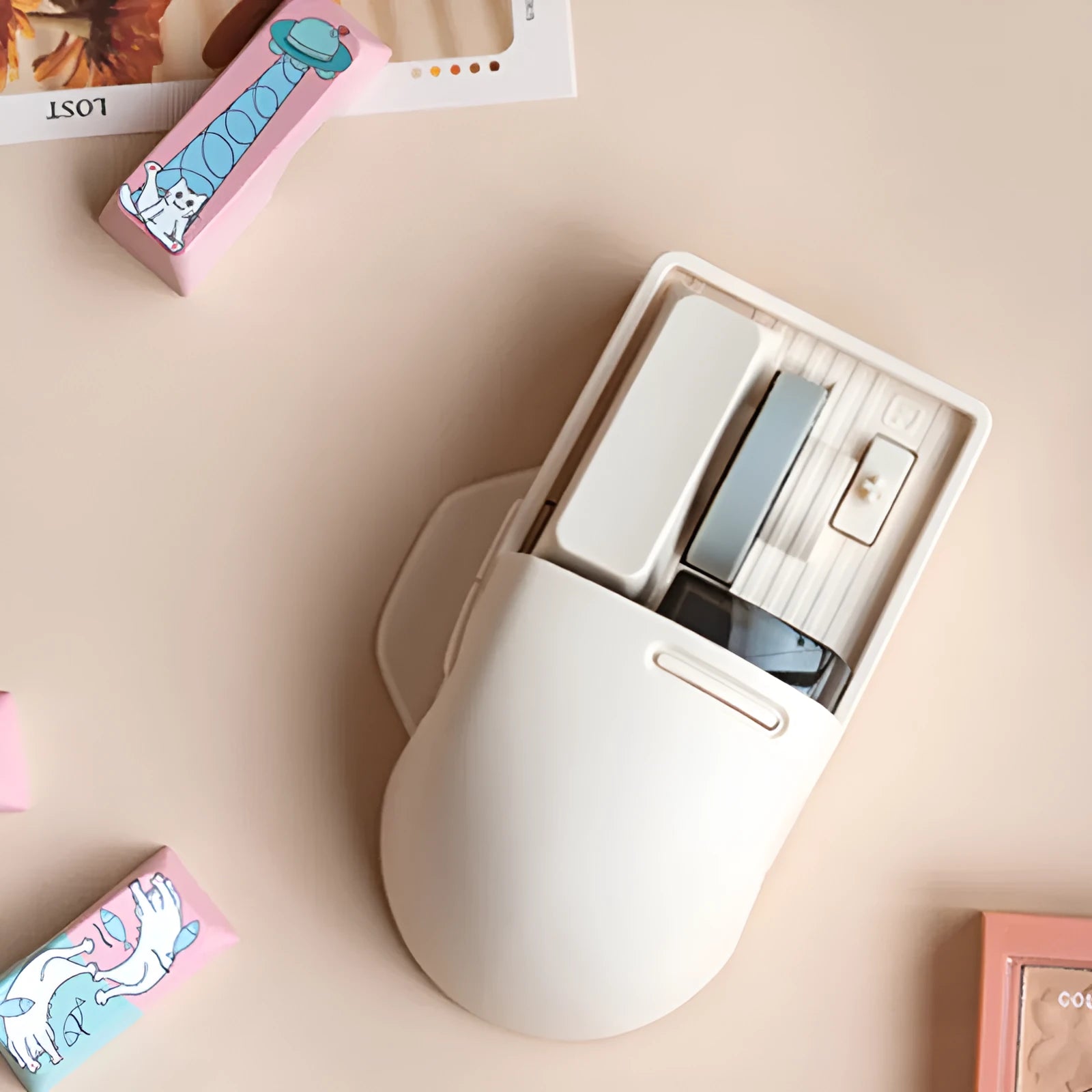 Xiaoqiao Three Mode Wireless Mouse in Tofu Colour with USB receiver and Type-C cable.