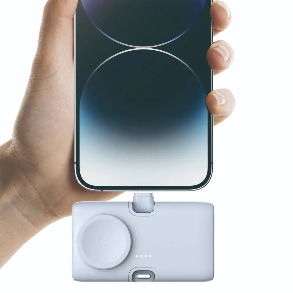 Small white plastic wireless power bank showing dimensions and Qi charging symbol.