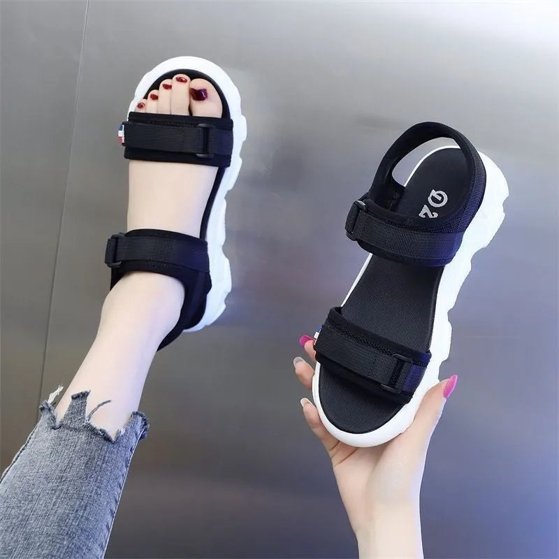 Women's summer sports sandals with round toe, cloth upper, and rubber sole in milky white and black