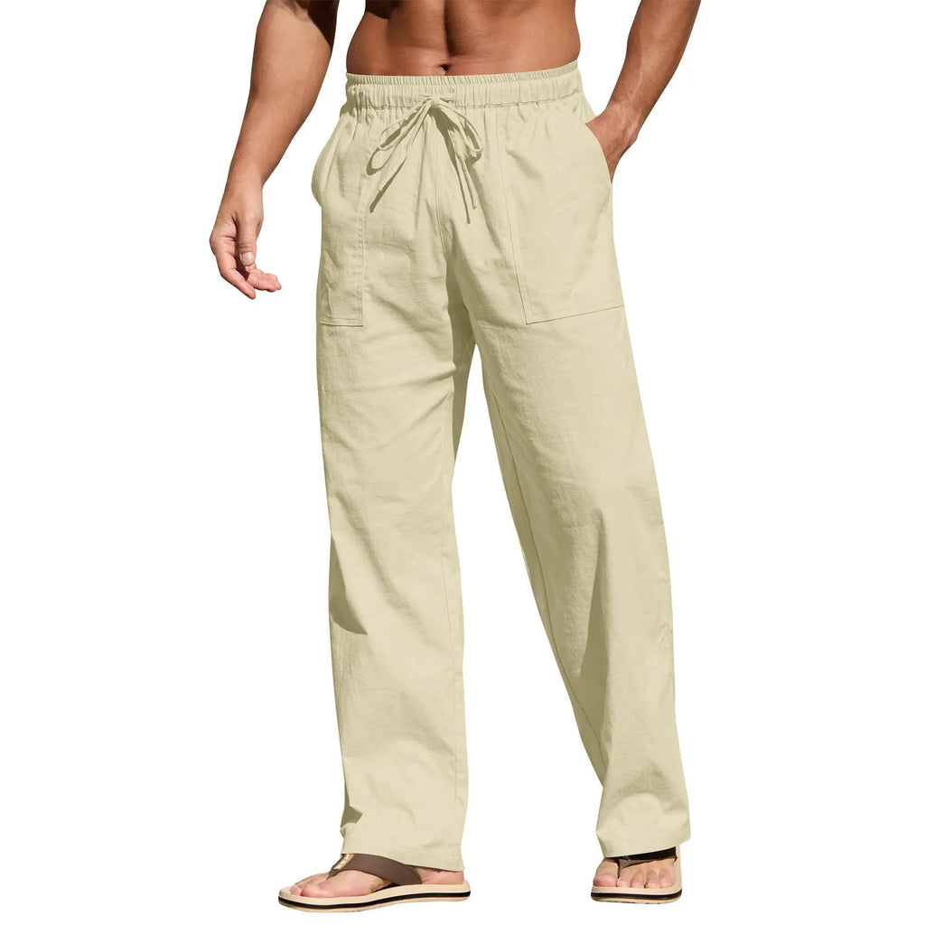 Men's beige cotton linen straight leg trousers with a drawstring elastic waistband laid flat.
