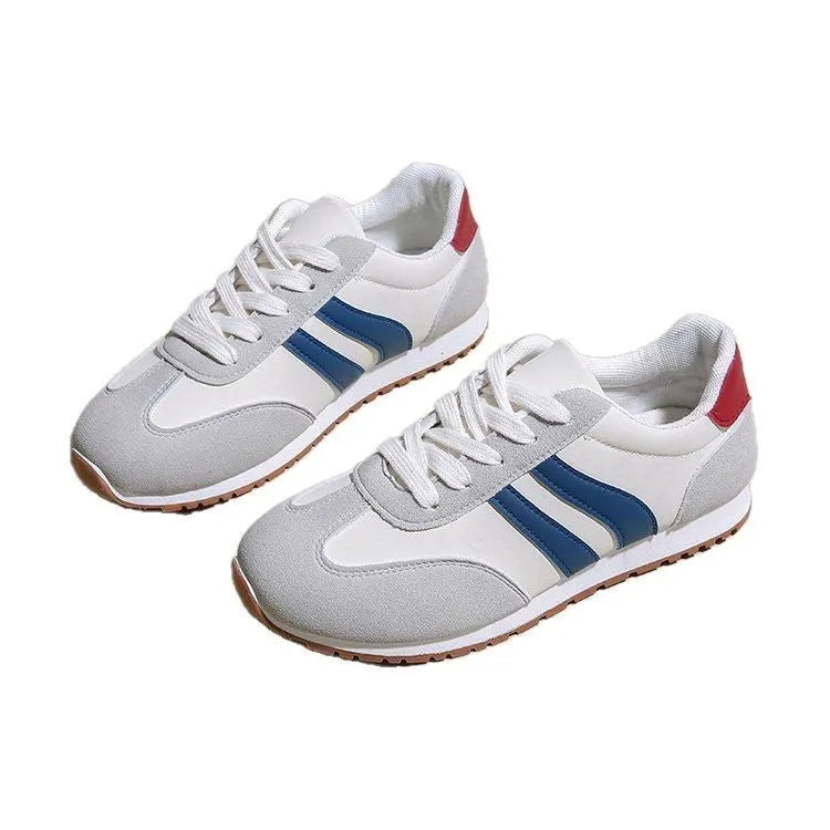 Blue and grey Cortez stripe casual sports shoes with flat heel and round toe on a wear-resistant rubber sole.