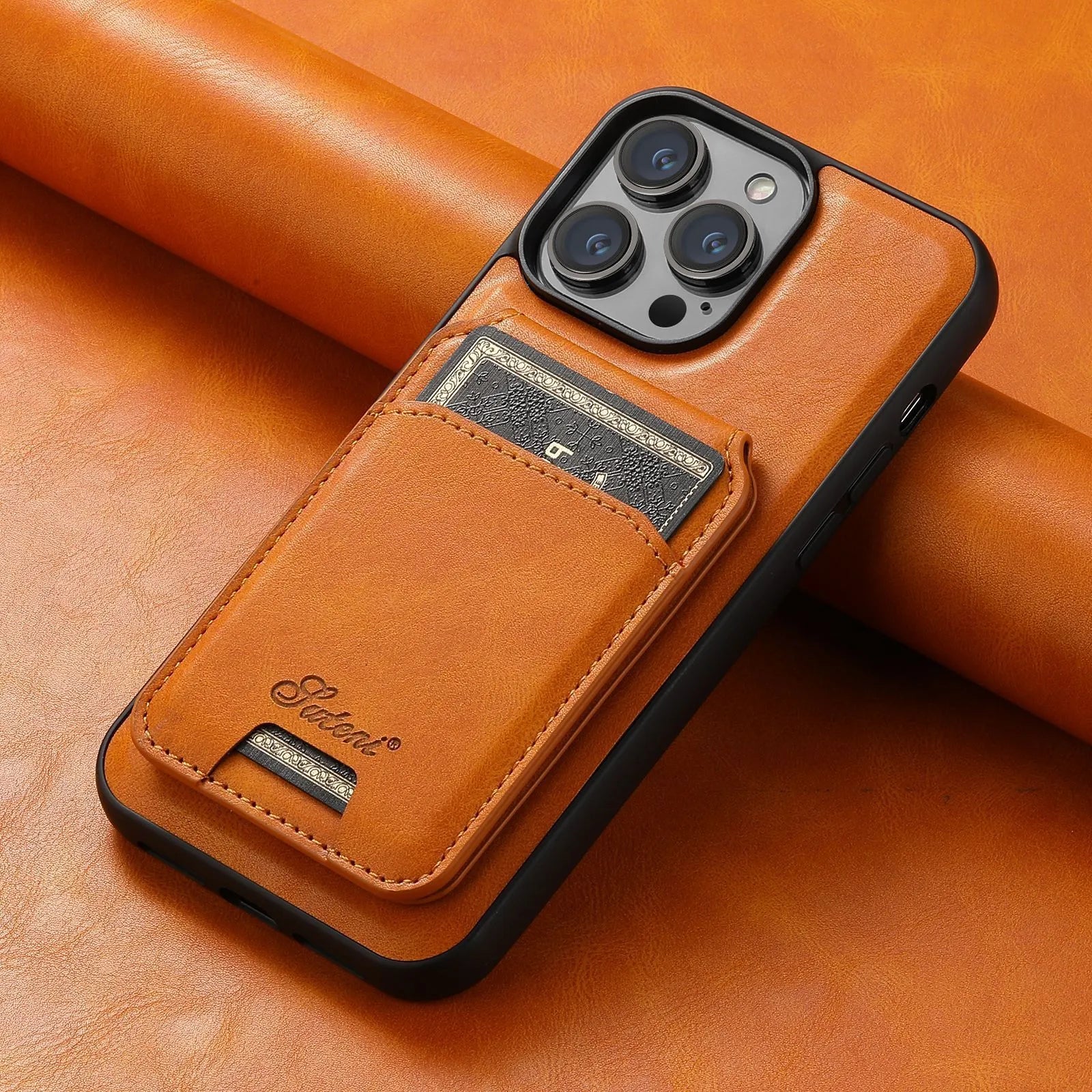 Black silicone iPhone case with Magsafe ring and rear card slot, showing oil wax pattern texture.