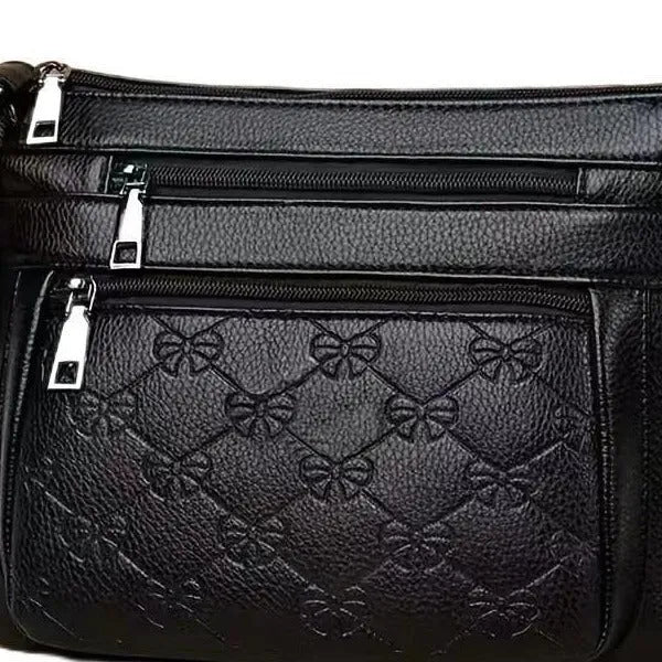 Butterfly Black women's PU shoulder messenger bag with crossbody strap and embossed details.