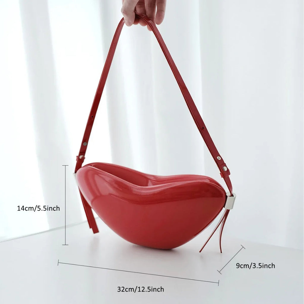 Red PU heart crossbody bag with single shoulder strap and sandwich pocket