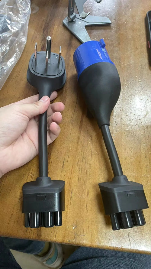 American standard adapter with car charger conversion wire showing copper core and polyethylene sheath