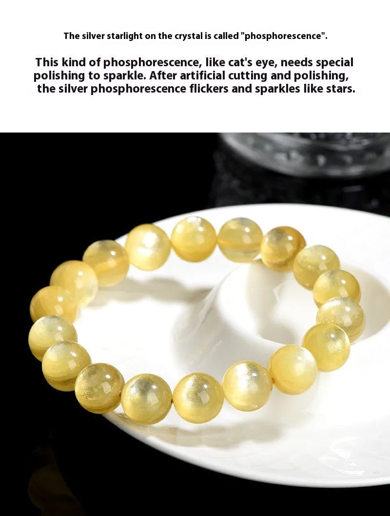 Yellow golden dragon mica bracelet with polished round geometric beads on wrist