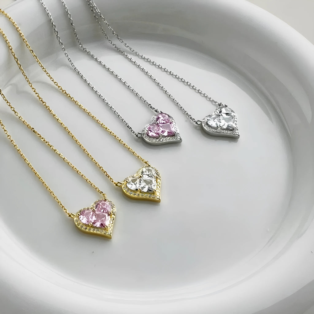 925 silver heart-shaped pendant necklace with cubic zirconia stone on white background