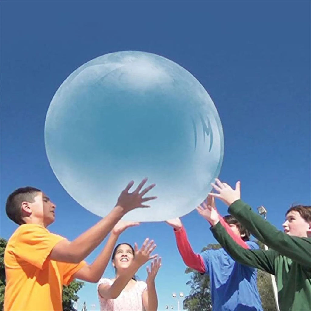 Large colourful inflatable bouncy ball in pink, yellow, green, and blue, shown in various sizes for children's play.