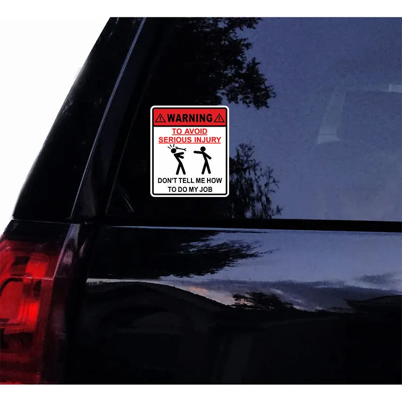 White rectangular adhesive safety sticker with black text reading warning to avoid serious injury, sized 14.9 by 12.6 centimetres.