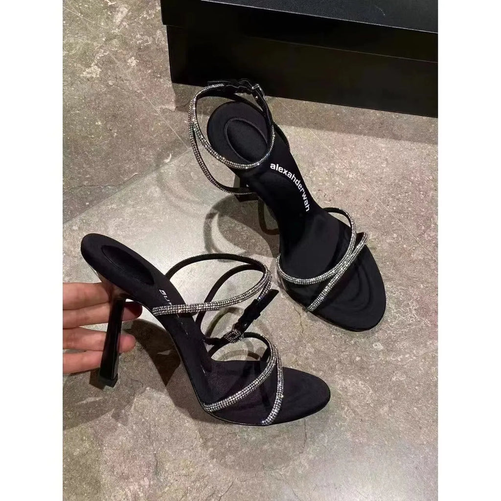Women's rhinestone cross strap stiletto high heels in black with pointed toe and 9cm heel