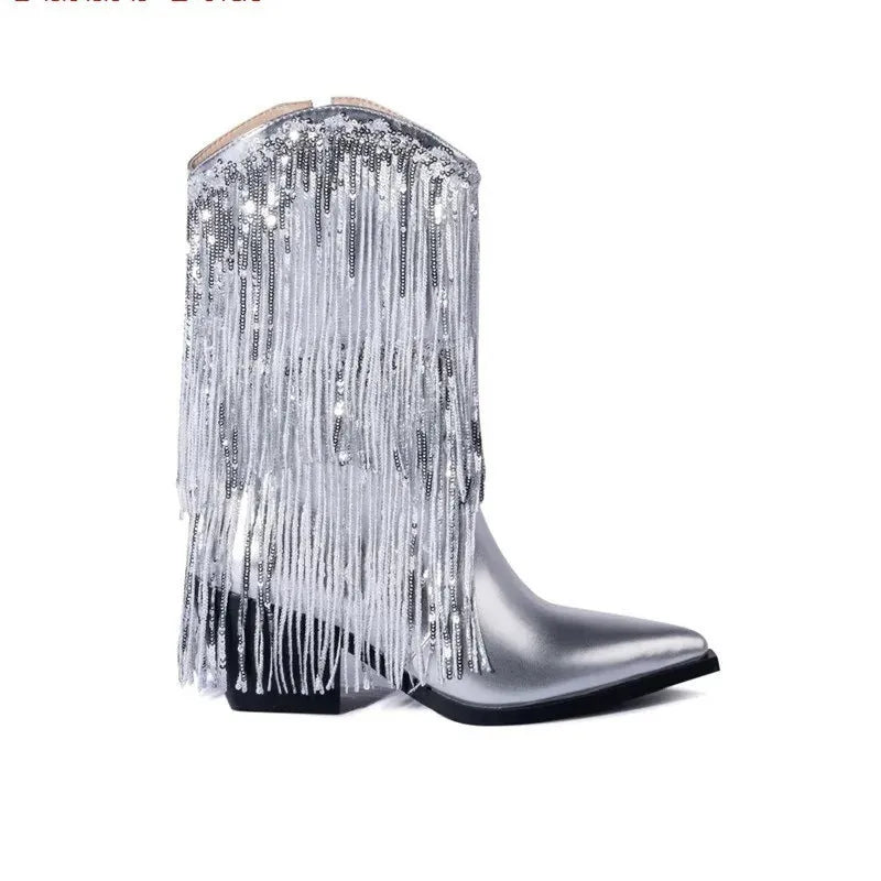 Women's black chunky heel tassel boots with pointed toe and super high stiletto heel on a white background.