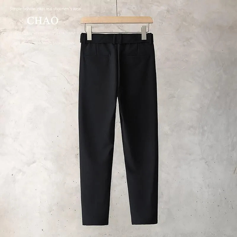 Boys slim straight wool trousers in tapered fit, shown in light grey colour.