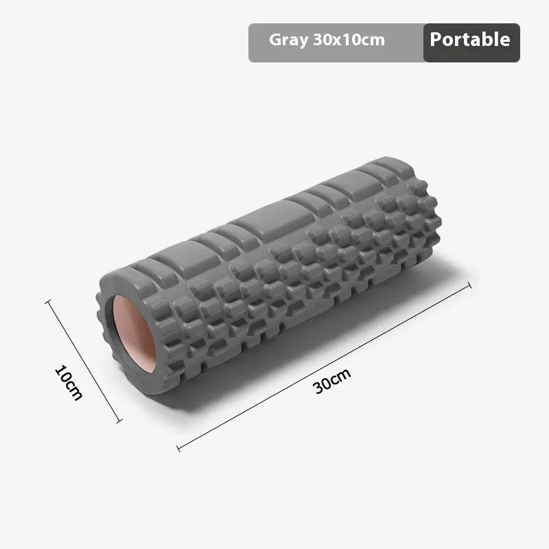 A firm EVA foam roller for fitness and yoga, shown in a selection of colours including black, pink, and sky blue.