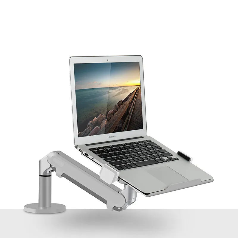 Aluminium alloy laptop stand with an adjustable air pressure arm in black colour on a wooden desk.