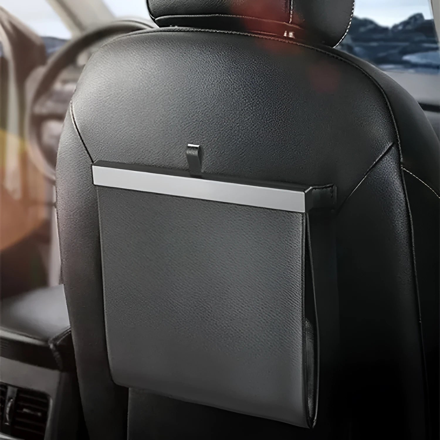 Car leather waterproof hanging garbage bag 27.5x26cm in black with light strip, shown inside a vehicle door pocket