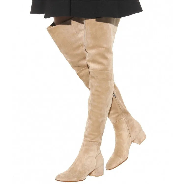 Grey suede women's flat over-the-knee boots with a pointed toe and low block heel on a white background.