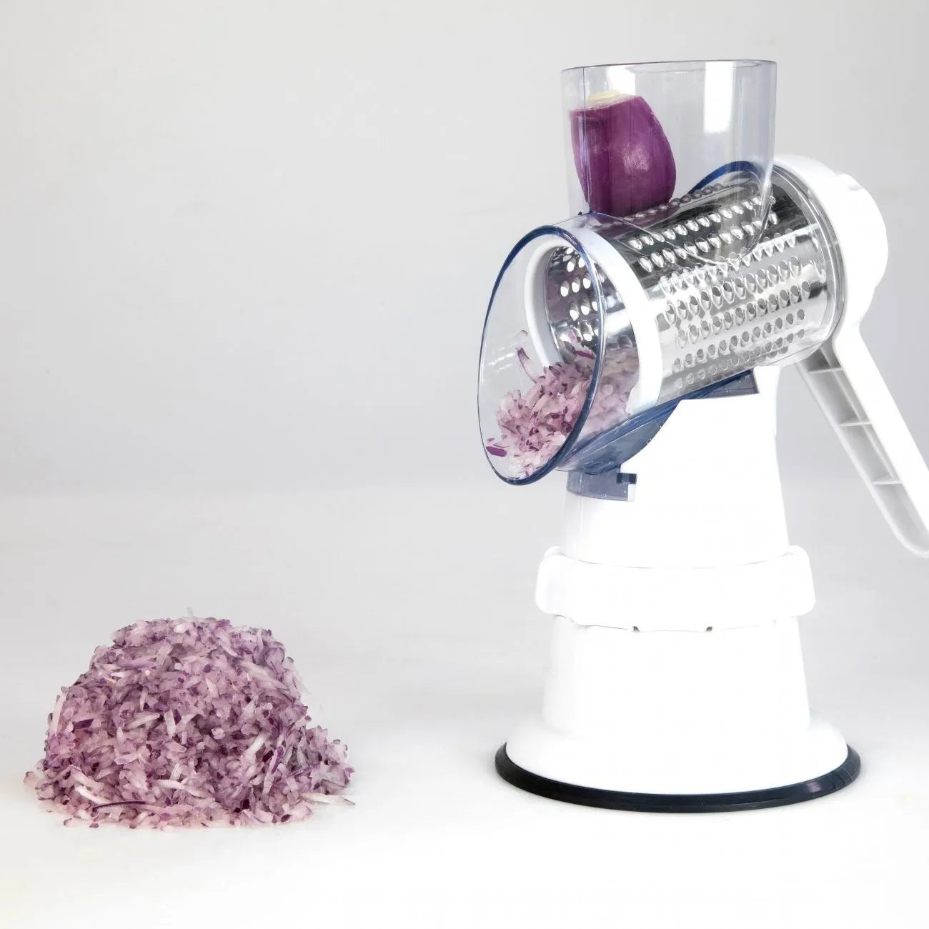 3 In 1 manual vegetable slicer in white BPA-free plastic with stainless steel blades and suction feet