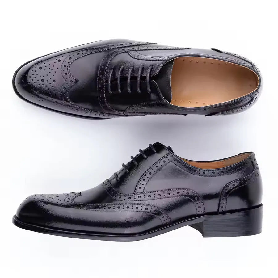 Men's purple Oxford shoes with hand carved detailing and pointed toe style on rubber sole