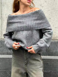 Grey off-the-shoulder acrylic sweater with strapless design and 3D pattern texture