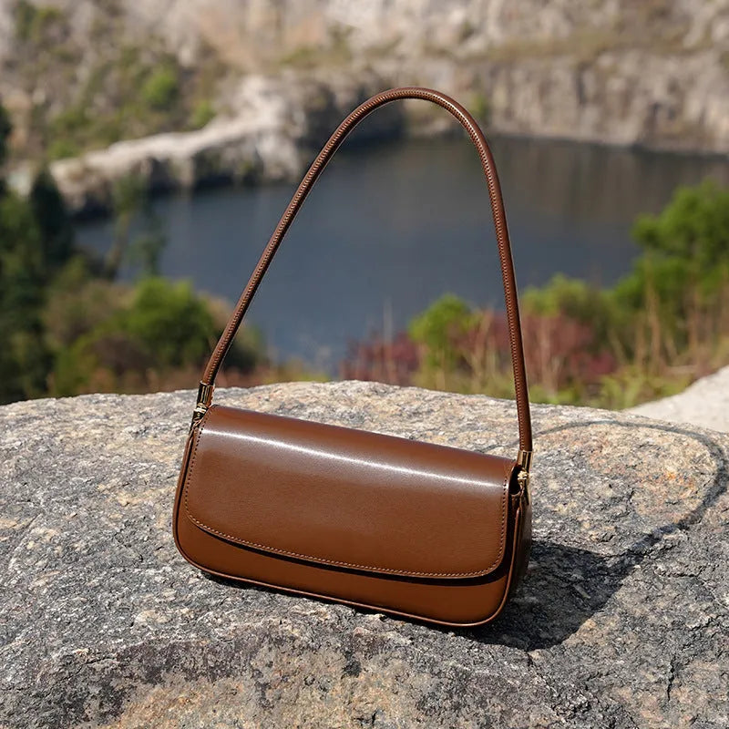 Genuine leather women's saddle bag in caramel, horizontal square shape with double shoulder straps
