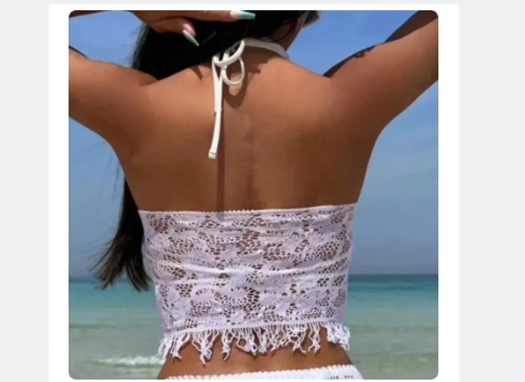 Women's white two-piece swimsuit with lace tassel beach cover-up skirt