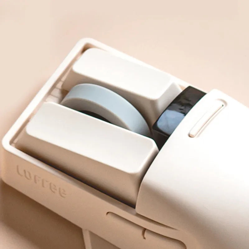 Xiaoqiao Three Mode Wireless Mouse in Tofu Colour with USB receiver and Type-C cable.