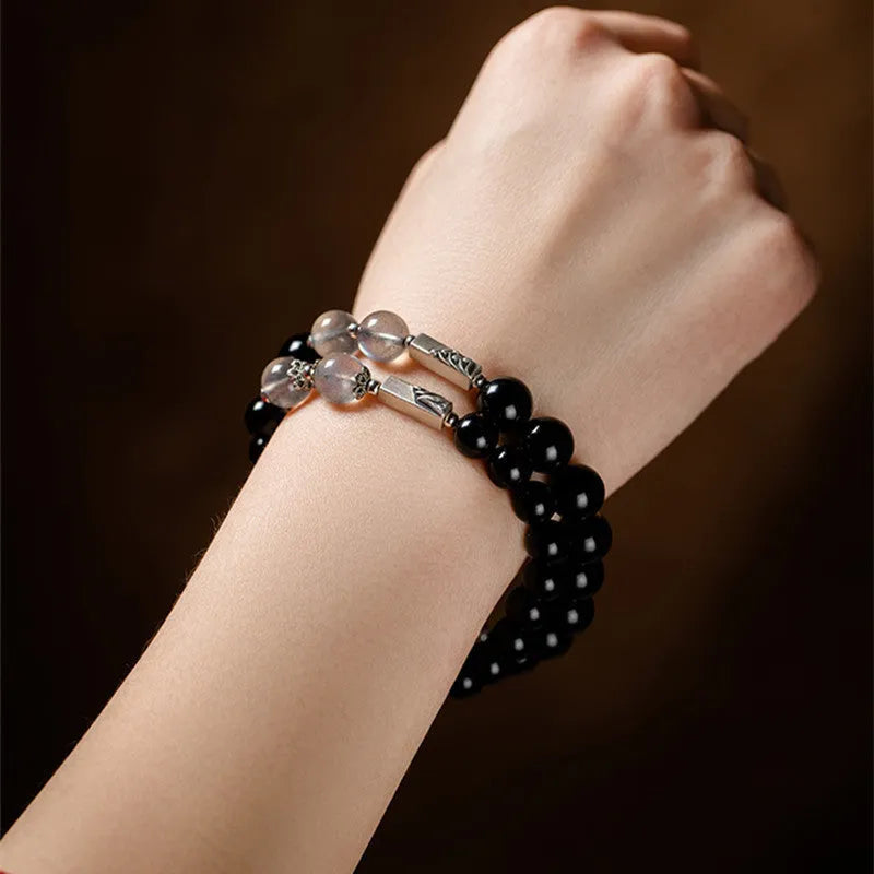 Obsidian Buddha beads couple bracelet DIY kit showing 8mm and 10mm beads with elastic cord